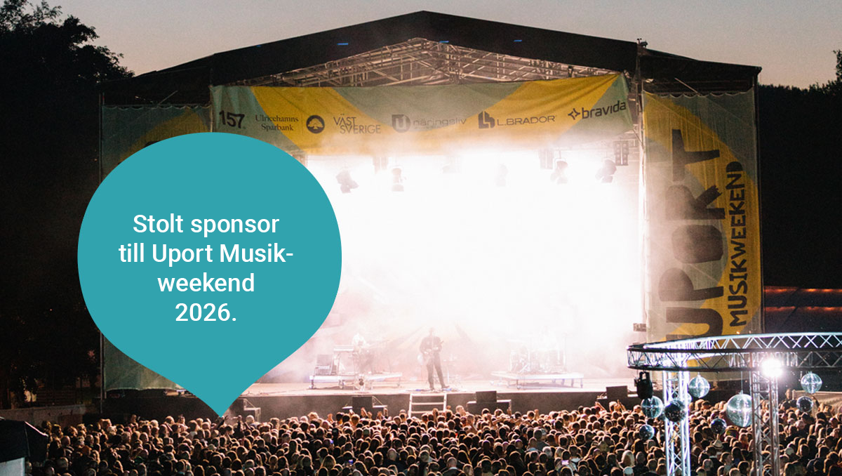 En stor upplyst scen med publik framför med texten stolt sponsor till Uportmusikweekend 2026.